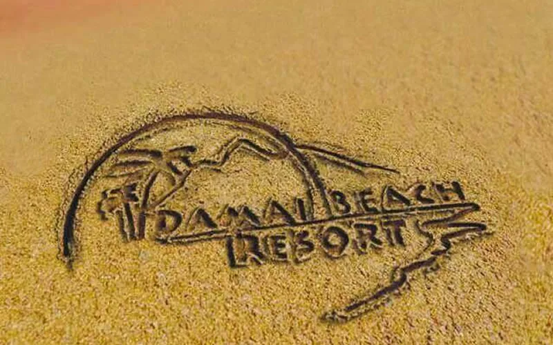 Damai Beach Resort logo in sand